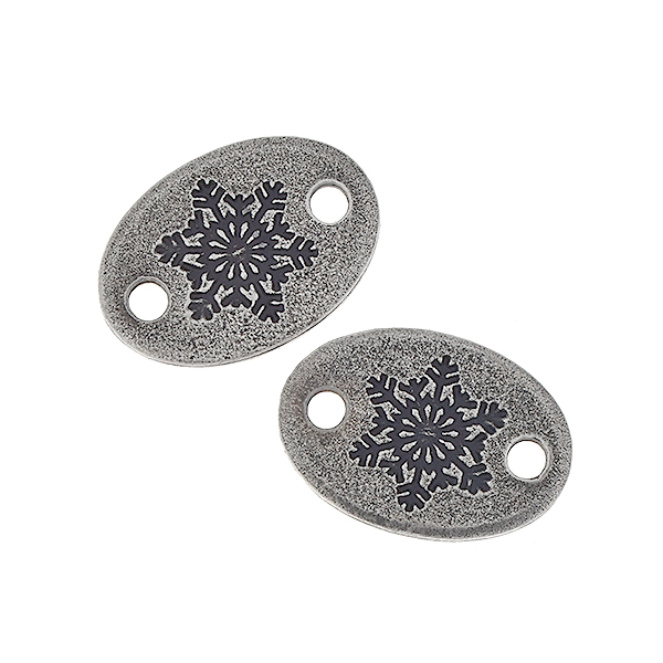 Snowflake on oval jewelry connector 